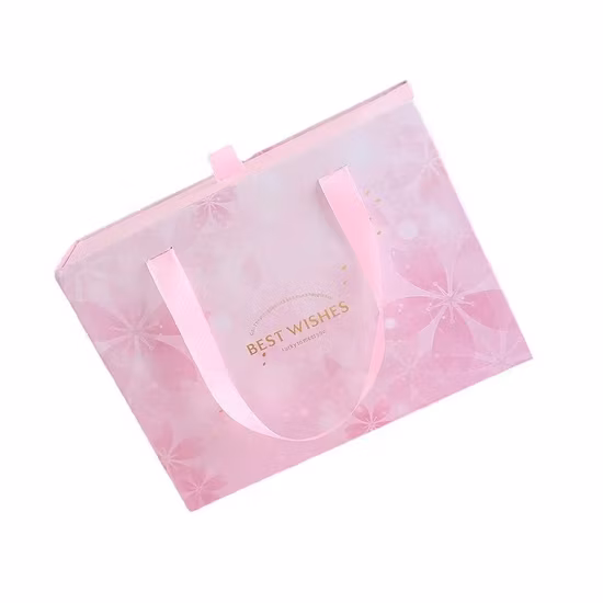 Bolsa de papel de cartón rosa de lujo con logotipo personalizado de muestra gratis con asa de cinta